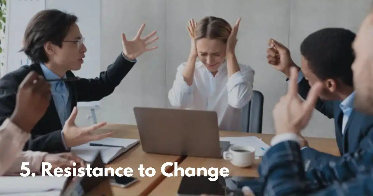 Stressed woman covering ears amid chaotic discussion in meeting.