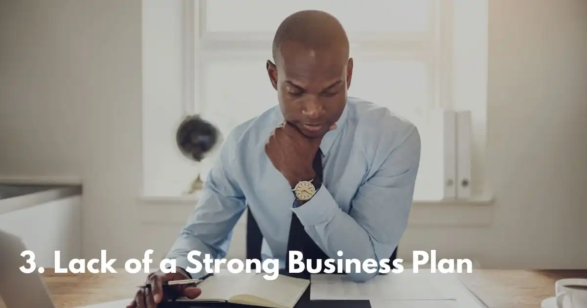 Pensive man in a shirt analyzing notes, lacking a business plan.